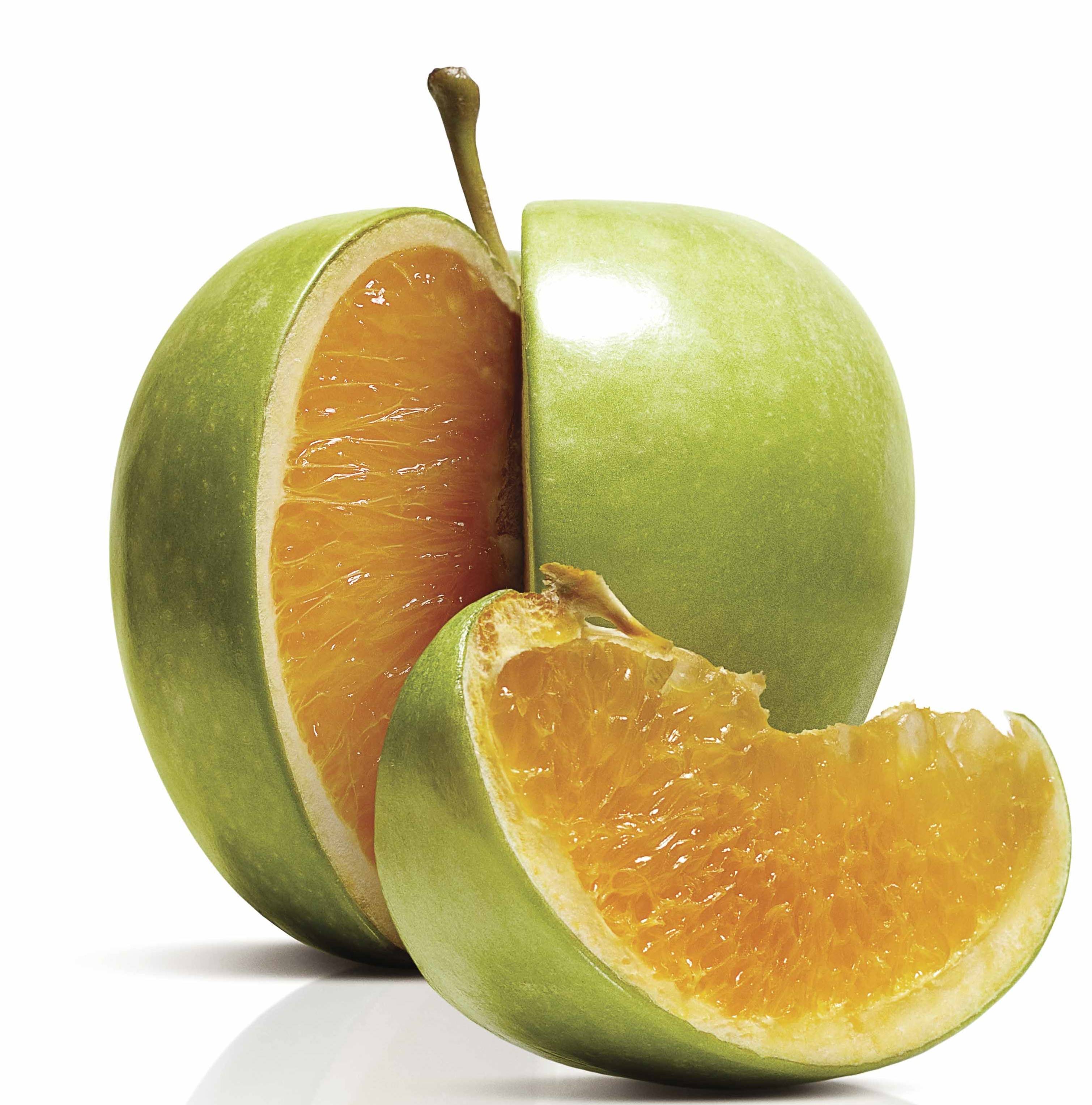 image of an apple with an orange inside