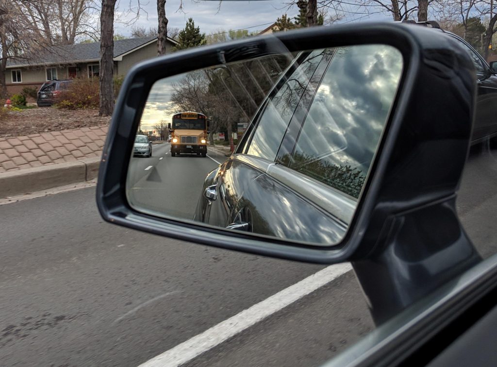 School Bus in rear view mirror